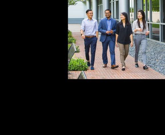 Sachin Shah walks with PharmD students on North Campus